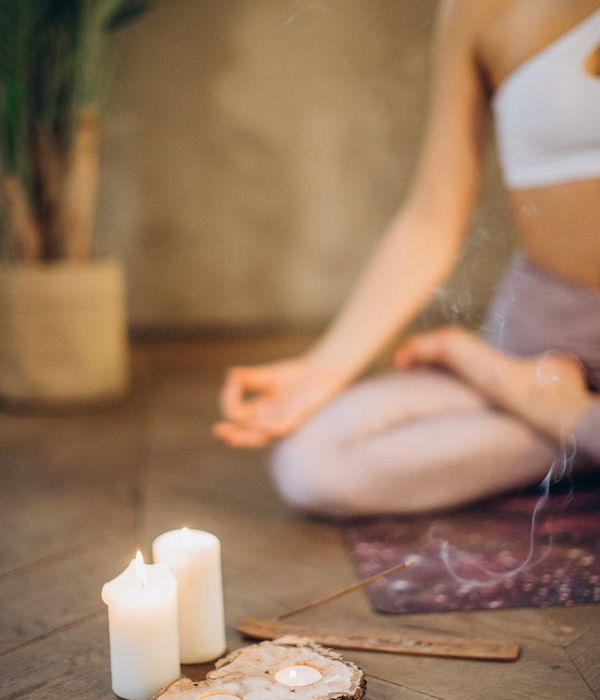 Woman in a calm yoga pose, embodying inner harmony and focus.